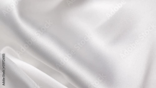 White cloth satin. Abstract background luxury cloth or liquid wave. Silk texture material. Abstract white elegant wallpaper design