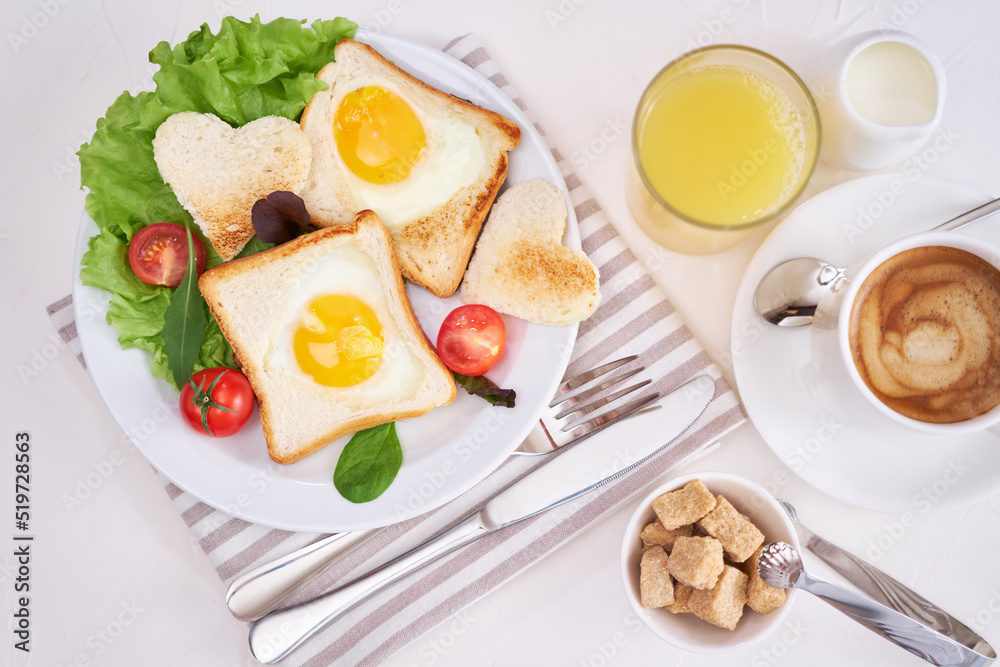 Fried Egg on Toast Bread and cup of fresh hot coffee on light grey background Fried Egg on Toast Bread and cup of fresh hot coffee on light grey background