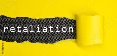 Retaliation. Word written yellow cardboard under modern black background