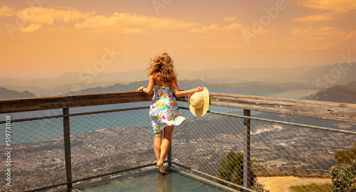 woman enjoying Bourget lake at sunset