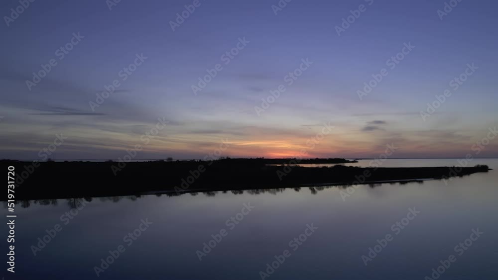 A dreamlike sunset with beautiful colors on the north german coast A dreamlike sunset with beautiful colors on the north german coast