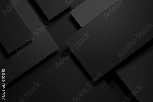 Dark carbon grey abstract geometric background with soar rectangele surfaces with corners, stripes, lines as monochrome stylish backdrop in elegant simple modern minimal style, top view.