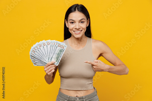 Fotografie Young smiling happy fun cool latin woman 30s she wearing basic beige tank shirt