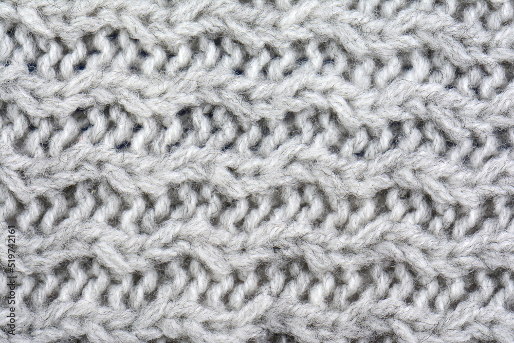 Macro knitted flat lay texture background. Close up pattern. Wool sweater macro detail. Macro knitted flat lay texture background. Close up pattern. Wool sweater macro detail.