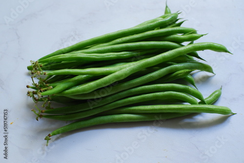 fresh green beans in white background