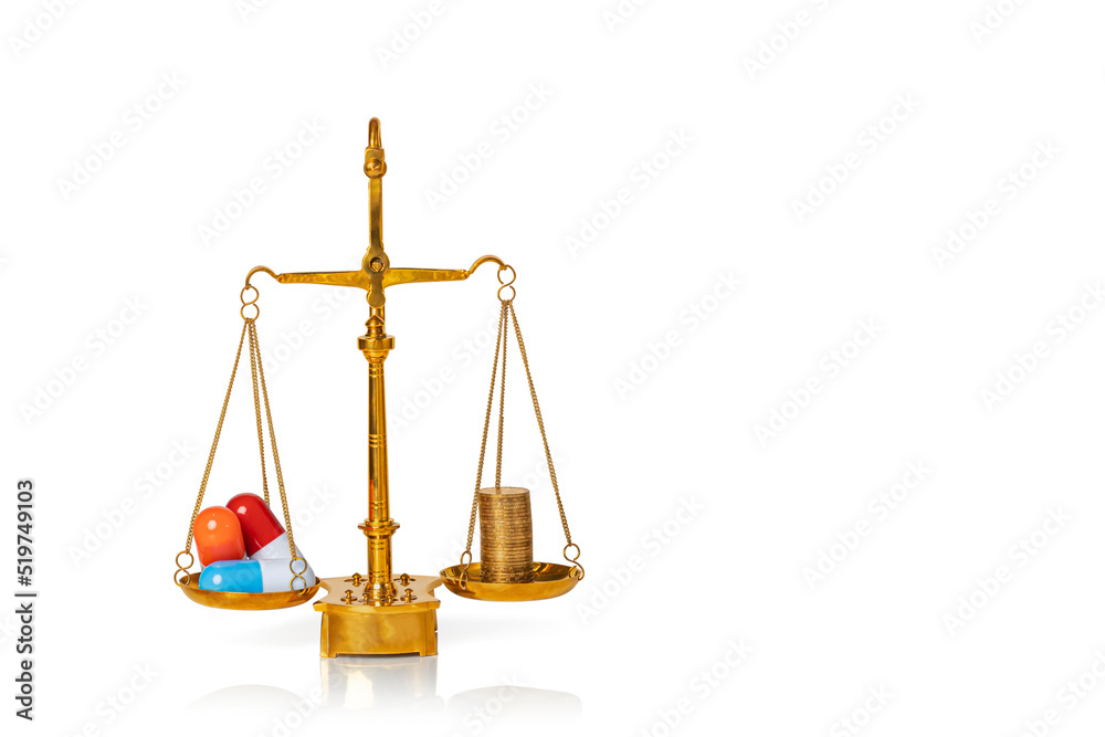 Pills. Capsules and coins on weighing scales isolated on white background. Medical concept. Copy space.. Pills. Capsules and coins on weighing scales isolated on white background. Medical concept. Copy space..