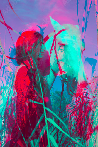 Colored Double exposure picture of a young woman and a white horse