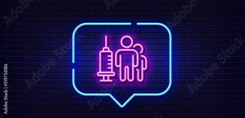 Neon light speech bubble. Medical vaccination line icon. Medicine vaccine sign. Pharmacy medication symbol. Neon light background. Medical vaccination glow line. Brick wall banner. Vector