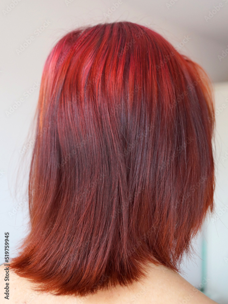 head of a red-haired girl close-up, rear view head of a red-haired girl close-up, rear view