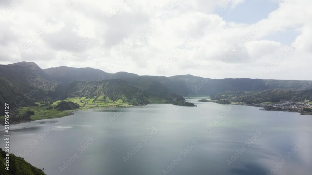A girl walks and looks at the big lakes on the island of Sao Miquel - Azores - 4k drone footage A girl walks and looks at the big lakes on the island of Sao Miquel - Azores - 4k drone footage