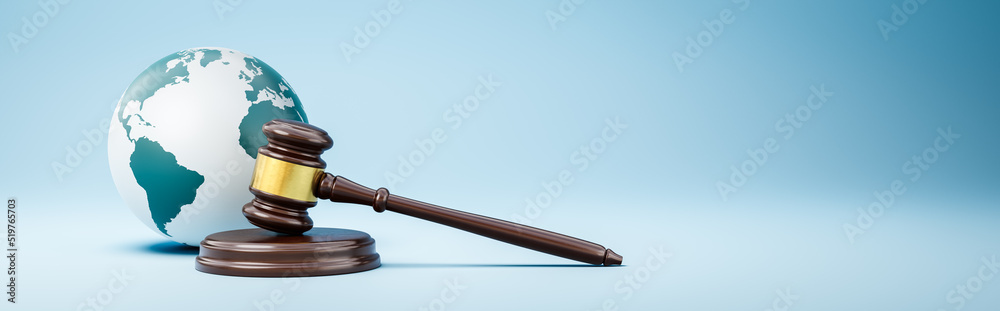 Judge's Gavel and Earth Planet on Blue Background