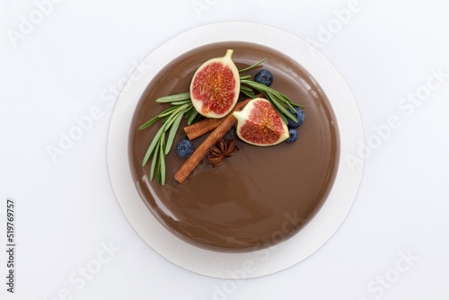 Chocolate mousse cake on white background top view