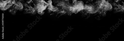 Panorama of steam, smoke, gas isolated on a black background. Swirling, writhing smoke to overlay on your photos. Smoky banner
