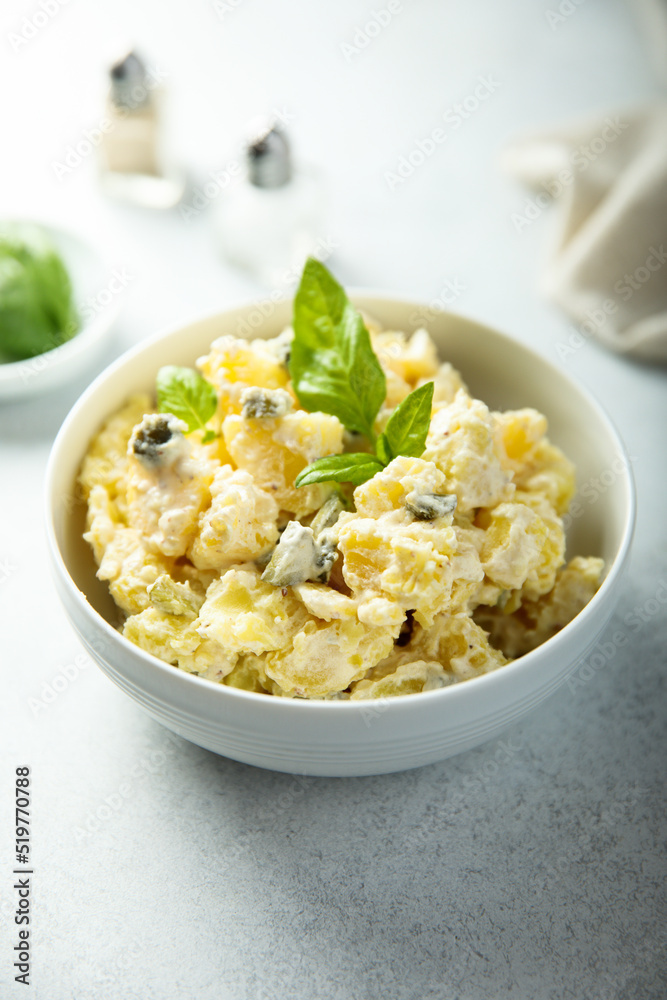 Traditional homemade potato salad with gherkins Traditional homemade potato salad with gherkins