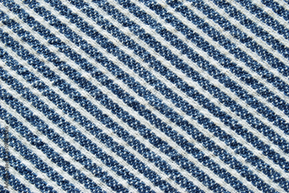 	
Striped in white and blue colors cotton fabric texture as background
