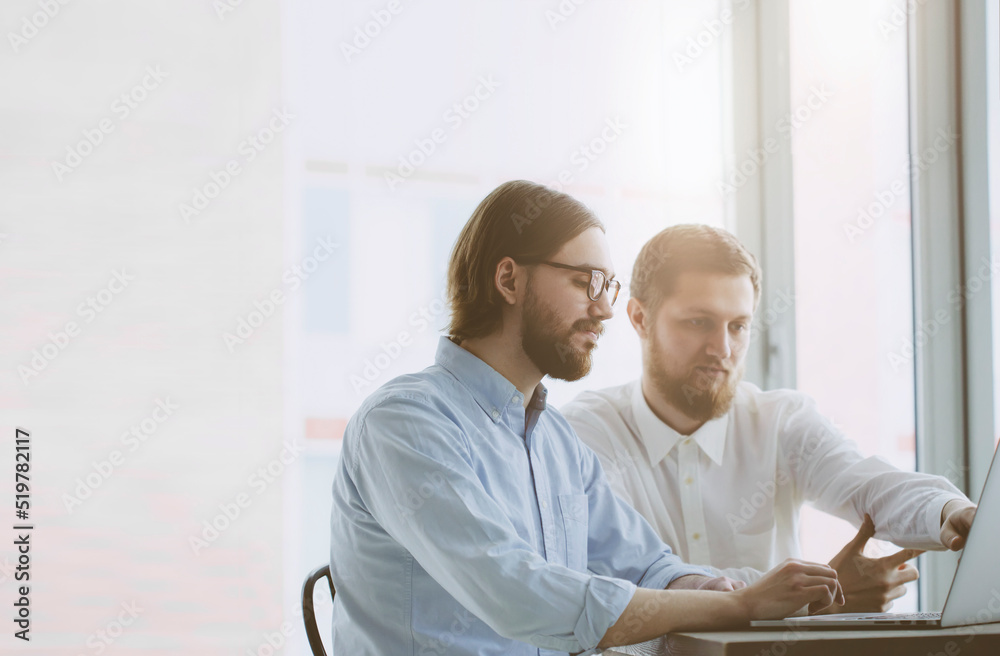 Business group working in co-working office place. Start up success analytics background concept. Business group working in co-working office place. Start up success analytics background concept.