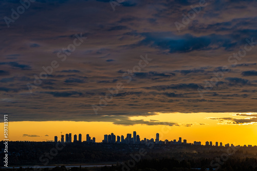 Urban cityscape silouette on sunset sky background