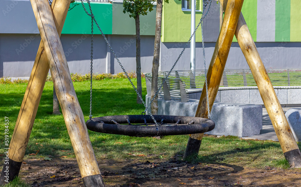 Fototapeta premium Children's swing. Swing cobweb. Playground. Children's park. Play equipment