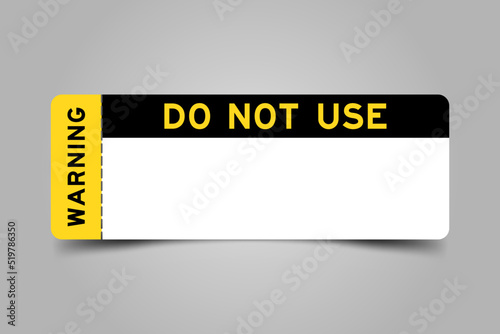 Yellow and black color ticket with word warning and do not use and have white copy psace on gray background