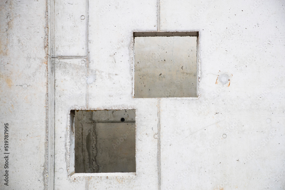 Stack of Prefabricated concrete slabs with hole for construction.