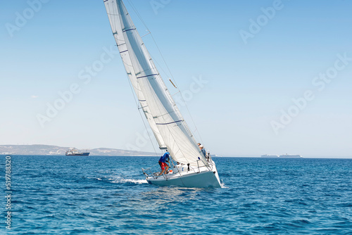 Yacht in open sea during sailing regatta