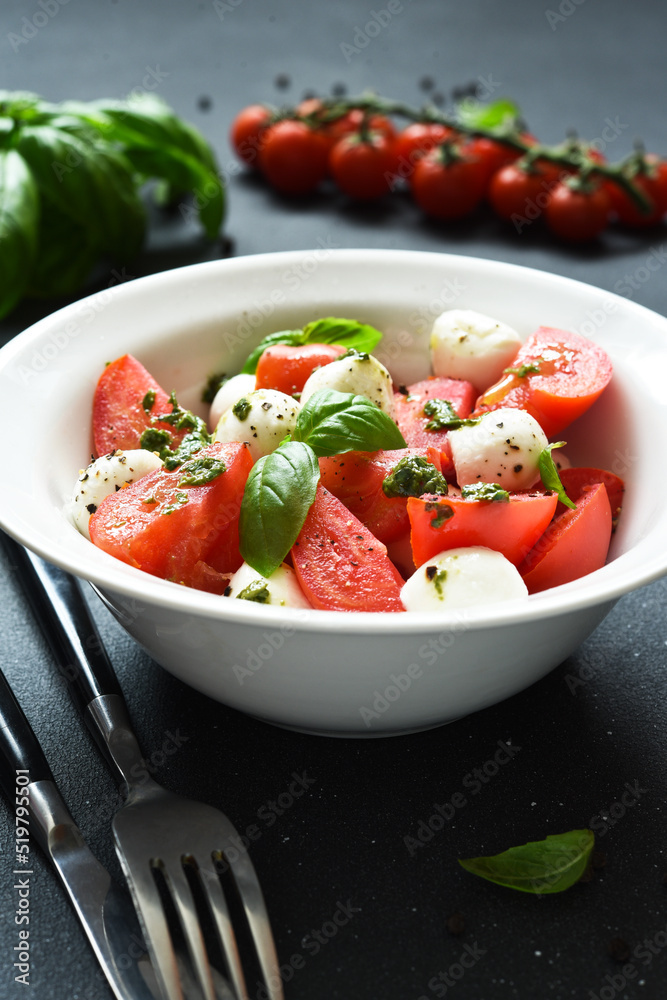 Italian appetizer caprese. Classic caprese salad with tomatoes and mozzarella