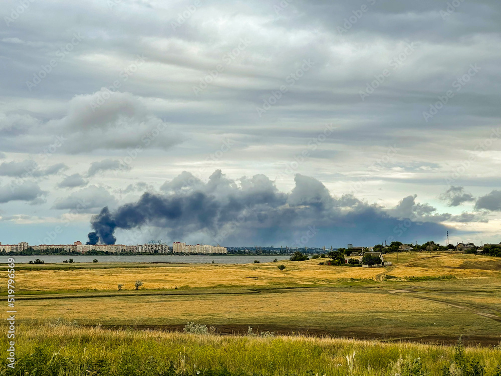 Fototapeta premium City in smoke after missile attack