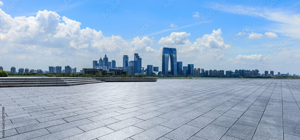 Cityscape of Suzhou City, Jiangsu Province, China. Empty square floor and city skyline scenery.