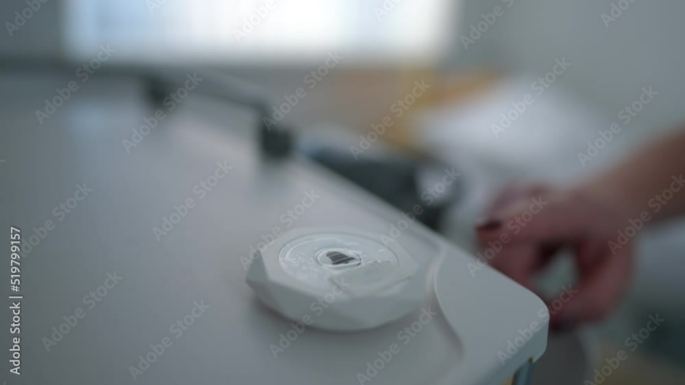 Close-up female finger pressing emergency call button in medical clinic. Unrecognizable Caucasian young ill woman calling for help in hospital ward. Convenience and service concept Close-up female finger pressing emergency call button in medical clinic. Unrecognizable Caucasian young ill woman calling for help in hospital ward. Convenience and service concept