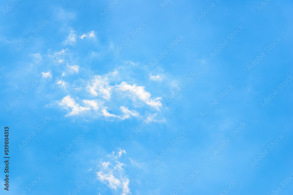 White fluffy clouds in the blue sky background.Cloudy white blue sky in the nice blue heaven sky. White fluffy clouds in the blue sky background.Cloudy white blue sky in the nice blue heaven sky.