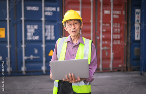 Asian man Senior Engineer worker shipment containers import export