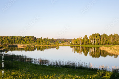 Picturesque lake in the evening photo