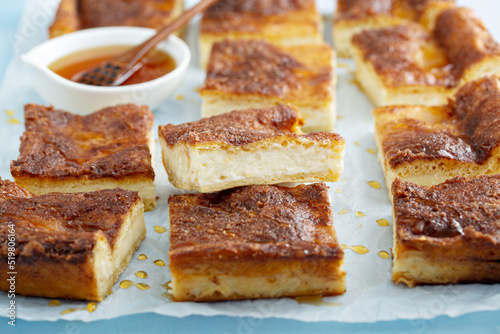 Cinnamon honey cheesecake pie cit into squares photo