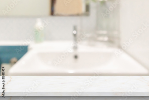 Empty white marble table top with blur bathroom background