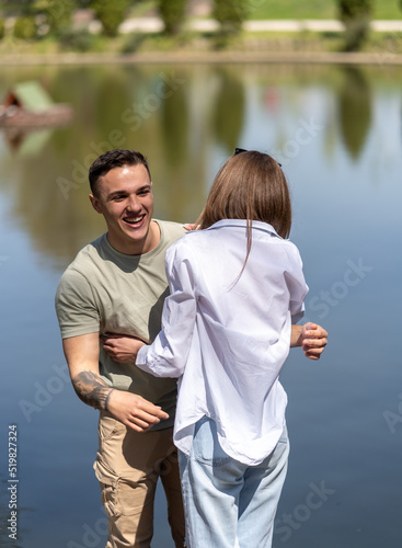 Portrait of a happy young couple enjoying outdoors