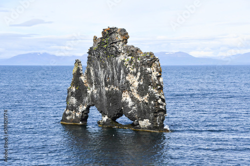Volcanic and black rock in the middle of the ocean of northern Iceland Europe