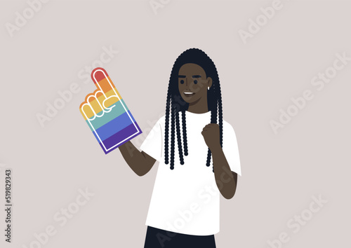 A Pride foam finger colored with rainbow colors, LGBTQ community support