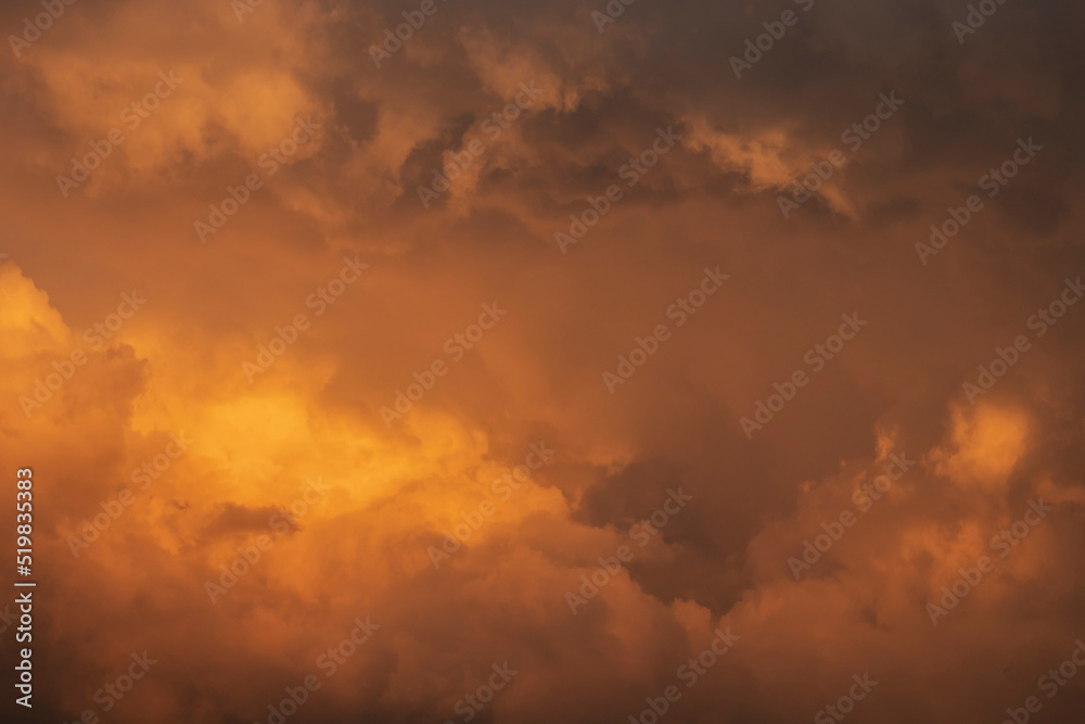 Beautiful sunset sky with amazing orange clouds.