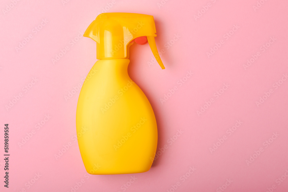 Sunscreen on a pink background. Plastic bottle of SPF sunscreen. Sunscreen selection.Summer travel beach flat lay composition, banner. Summer vacations and spf uv-protecting skin care concept. Sunscreen on a pink background. Plastic bottle of SPF sunscreen. Sunscreen selection.Summer travel beach flat lay composition, banner. Summer vacations and spf uv-protecting skin care concept.