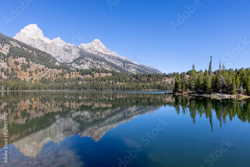 Scenic Reflection Landscape of the Tetons in Taggart Lake in Autumn