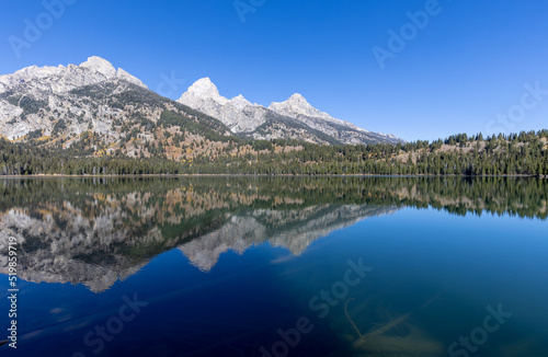 Scenic Reflection Landscape of the Tetons in Taggart Lake in Autumn