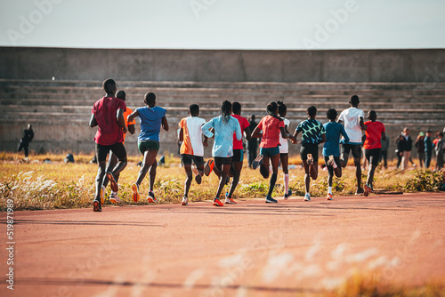 Kenyan marathon runners training at the athletics track in the town of Eldoret near Iten, the center of world endurance running. Preparation in Kenya for a running race