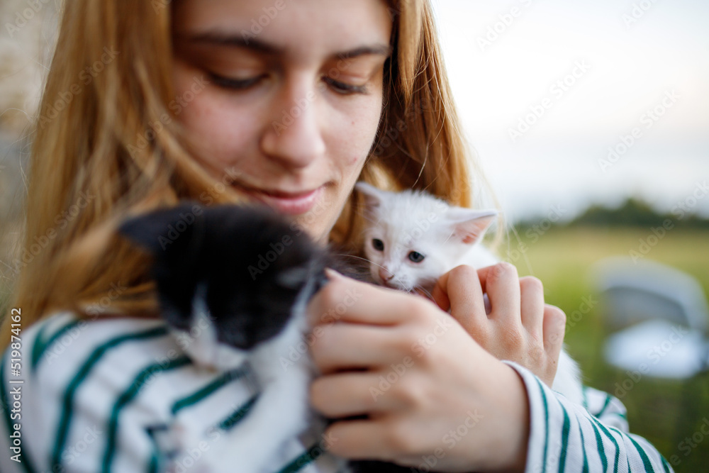 Emotional portrait of a young woman hugging her cat
Emotional portrait of a young woman hugging her cat