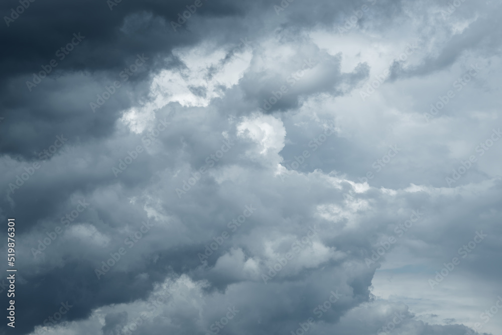 Stormy rain big fluffy clouds. Dark sky. Natural scenic abstract background. Weather changes backdrop. Sky filled with voluminous clouds. Stormy rain big fluffy clouds. Dark sky. Natural scenic abstract background. Weather changes backdrop. Sky filled with voluminous clouds.