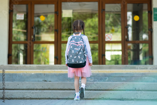 First day at school. A little school girl in first grade. Pupil of primary school. Back to school. © Natalya Temnaya