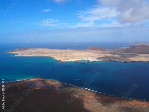 View of La Graciosa Island from Mirador del Rio - Cesar Manrique architecture on the summit of the Risco de Famara. Lanzarote, Canary Islands, Spain