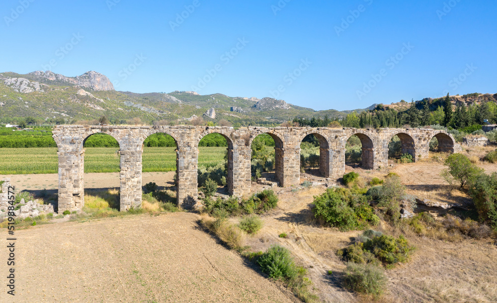 Roman aqueduct at Aspendos. Tower for turning water. Ruin. Turkey. Aerial photography. View from above