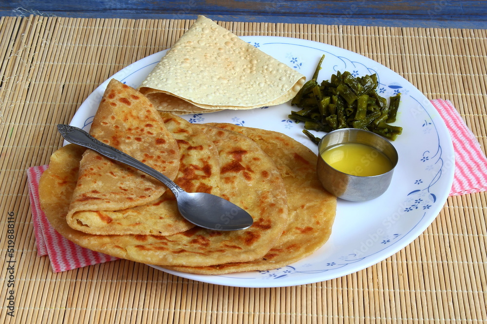 indian gujarati traditional sweet stuffed flatbread or sweet roti vedmi