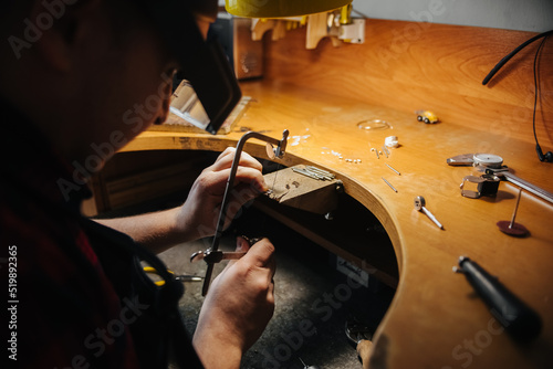 jeweler making a silver jewelry