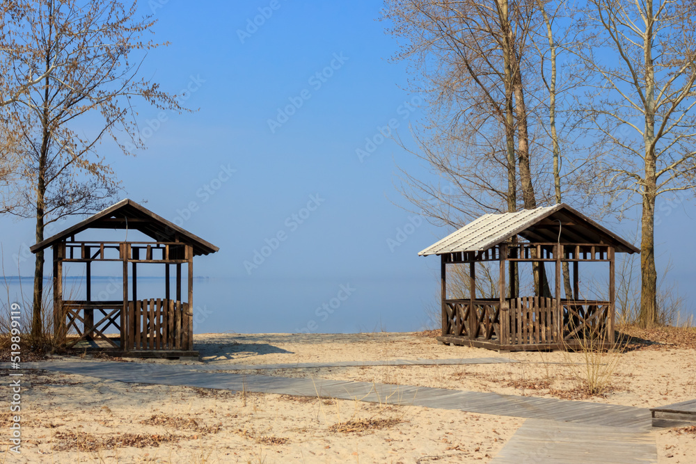 Wooden canopies by the river